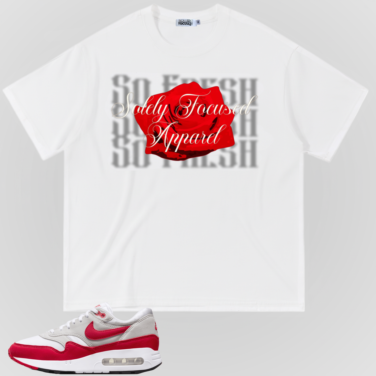 White graphic T-shirt with red rose and gray lettering on the front