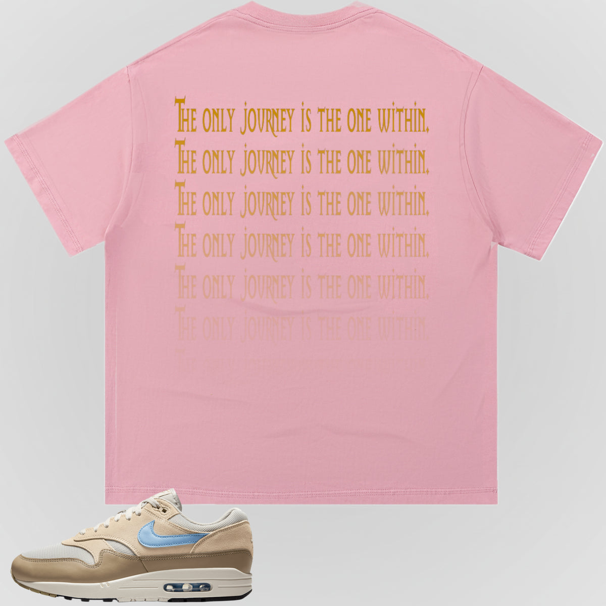 Pink crewneck T-shirt with gold stacked text graphic on back