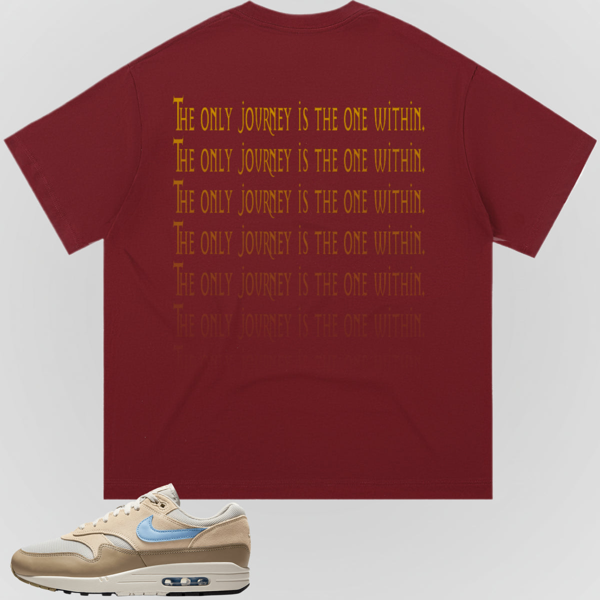 Wine red crewneck T-shirt with gold stacked text graphic on back