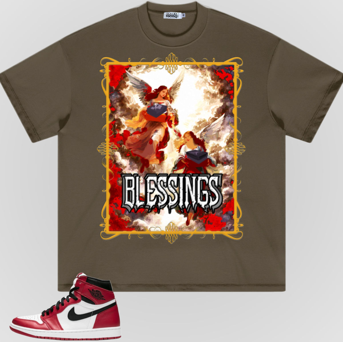 Dark brown T-shirt with gold-bordered 'BLESSINGS' angel graphic on front.