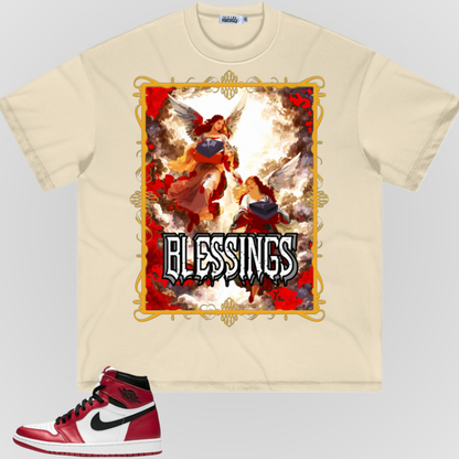 Cream T-shirt with gold-bordered 'BLESSINGS' angel graphic on front.