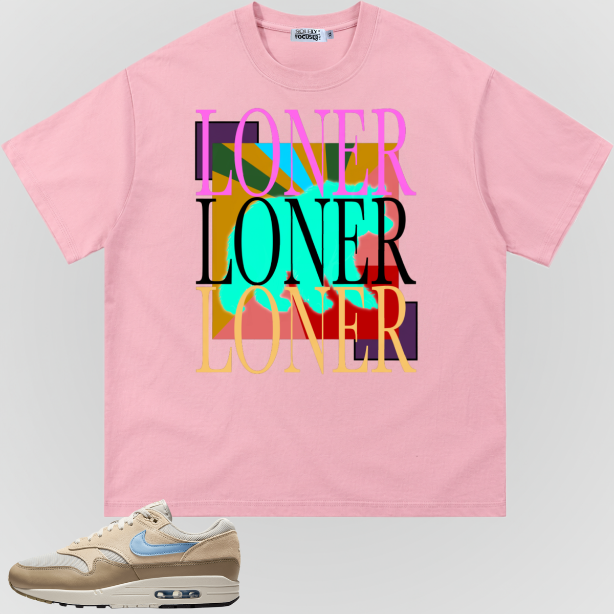 Pink crewneck T-shirt with colorful stacked “LONER” graphic on front