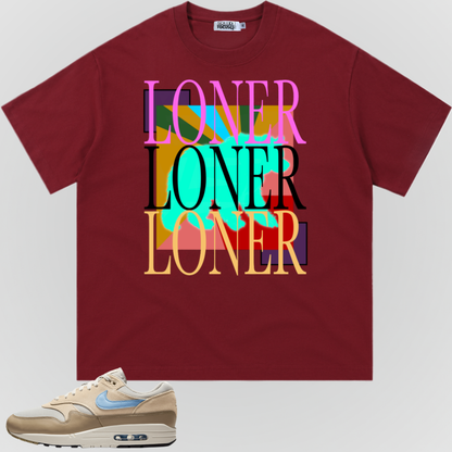 Wine red crewneck T-shirt with colorful stacked “LONER” graphic on front