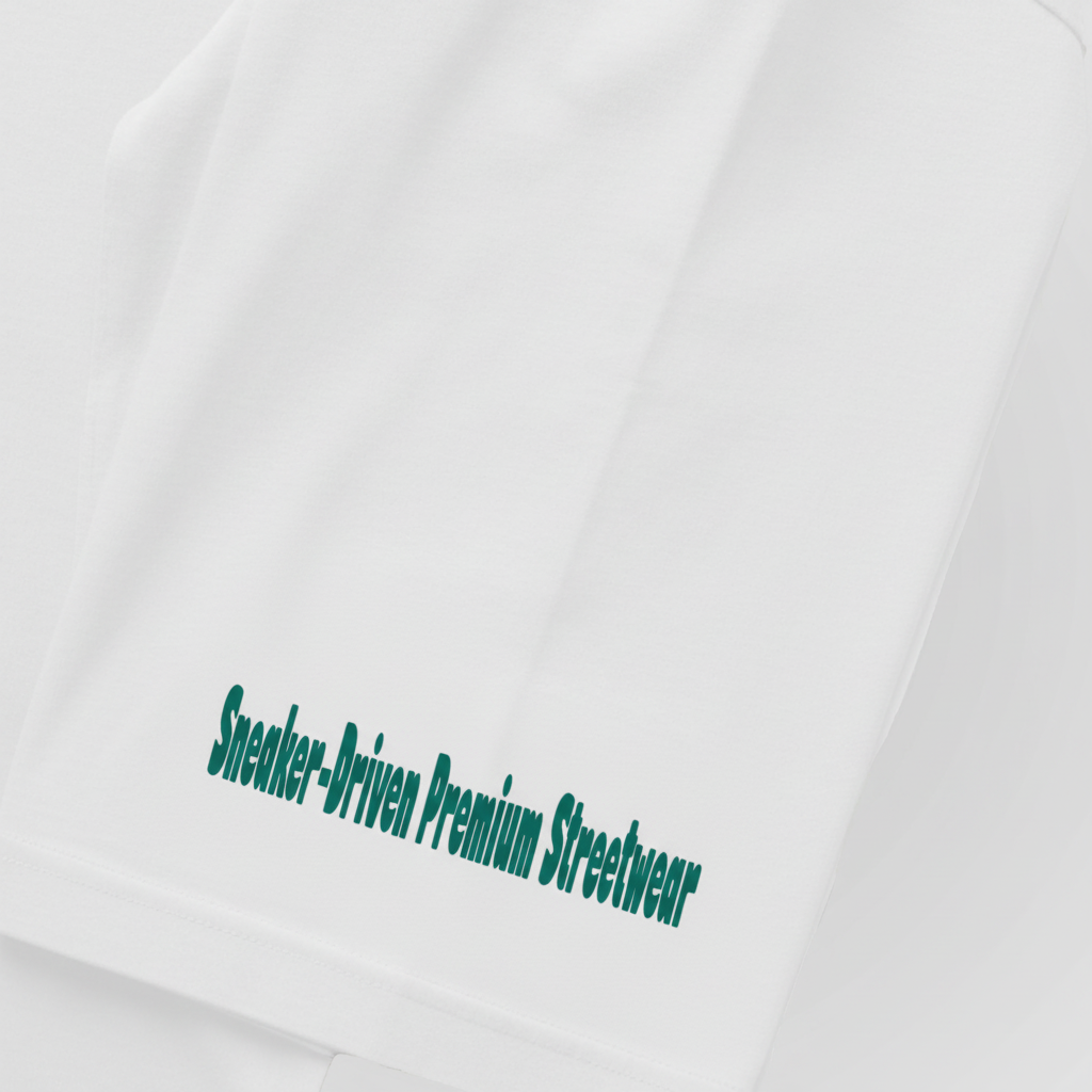 White T-shirt sleeve graphic text in green near hem